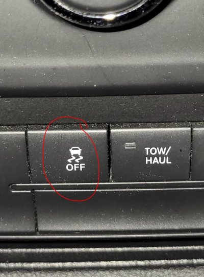 Traction button.JPG